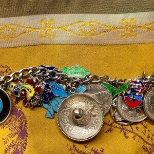 Sterling silver charm bracelet with travel charms